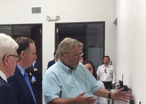 Describing the Tait Communications Grid Link Data Modem to the Prime Minister of New Zealand, Hor. John Key